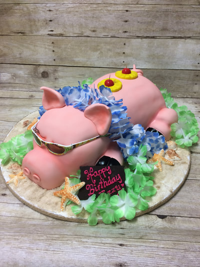 Happy birthday cake of a cute pig laying down wearing sunglasses surrounded by tropical flowers.
Click here for larger image.
