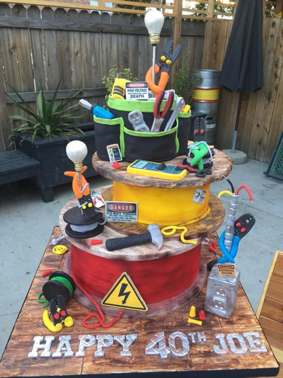 Birthday cake for an electrician, 3 tier with tools made out of fondant that an electrician would use.
Click here to see larger image.