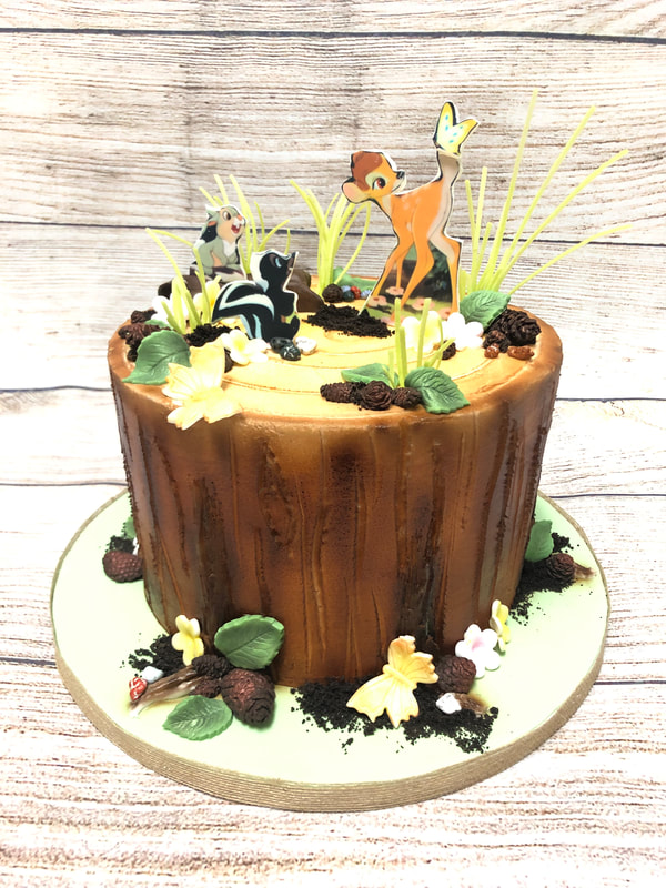 woodland theme baby shower cake.
